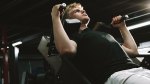 Young fit male performing a hack squat machine alternative for bigger quad muscles