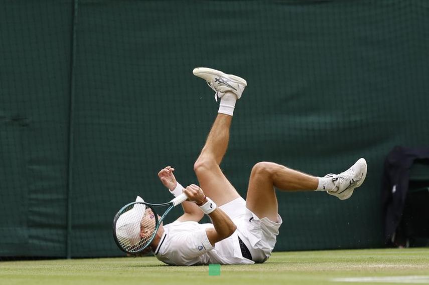 Tennis-De Minaur pulls out of Djokovic quarter-final with injury